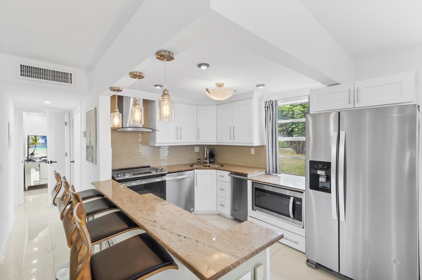 Discover luxury living in this true corner unit, a fully updated - Beach Condo for sale in Delray Beach, Florida on Beachhouse.com
