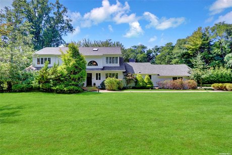 Nestled into the beauty of a quiet and picturesque setting in - Beach Home for sale in Lloyd Harbor, New York on Beachhouse.com