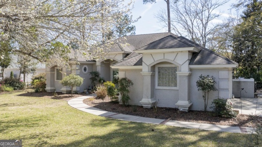 This charming 3-bedroom, 2-bath home, nestled in the gated - Beach Home for sale in Saint Marys, Georgia on Beachhouse.com
