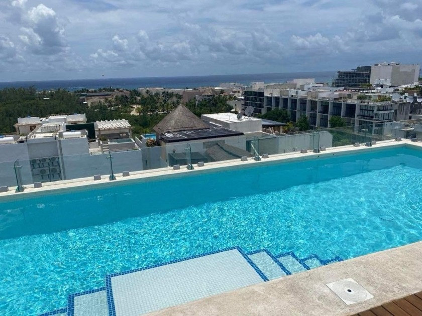 Modern one-bedroom, one-bathroom apartment in Playa del Carmen - Beach Condo for sale in Playa Del Carmen,  on Beachhouse.com