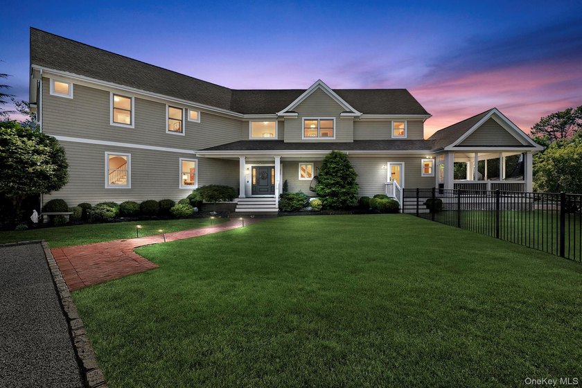 Set on 1.15+/- acres along a tranquil canal with direct access - Beach Home for sale in Remsenburg, New York on Beachhouse.com