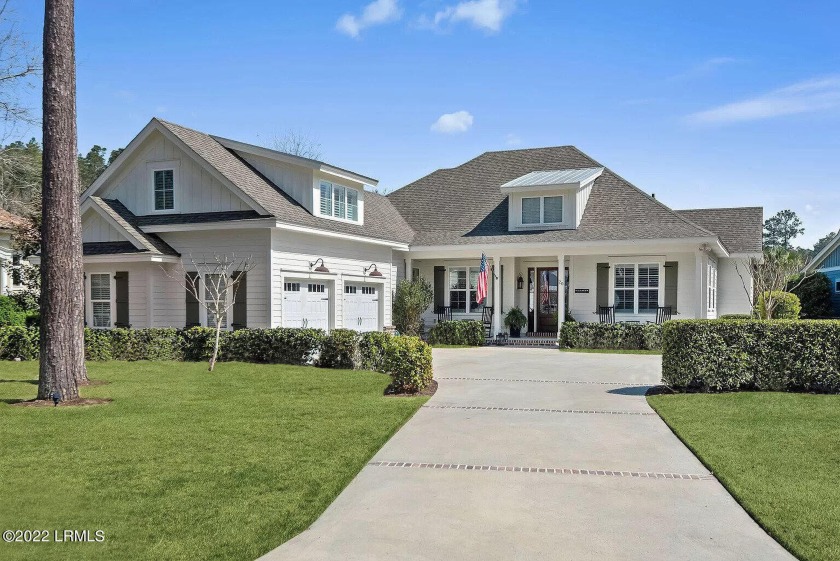 This pristine award-winning home beautifully nestled on nearly a - Beach Home for sale in Bluffton, South Carolina on Beachhouse.com