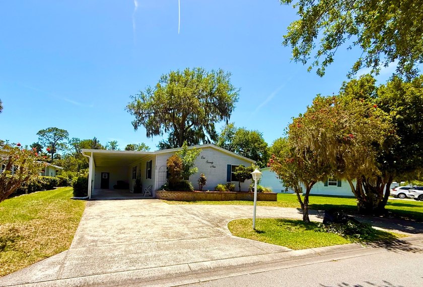 Spacious 3 Bedroom, 2 Bath Palm Harbor Home with Lake Views in - Beach Home for sale in Flagler Beach, Florida on Beachhouse.com