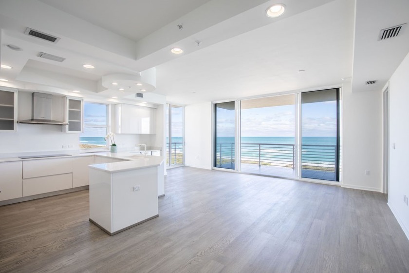 Step into this never-lived-in oceanfront haven, a canvas - Beach Home for sale in North Hutchinson Island, Florida on Beachhouse.com
