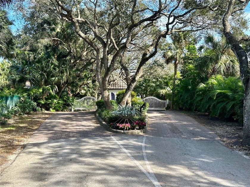 A fabulous pool home in gated oceanfront enclave.  Traditional - Beach Home for sale in Vero Beach, Florida on Beachhouse.com