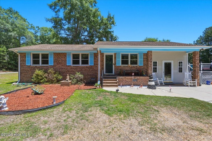 Located just 15 minutes from Ocean Isle Beach, this Shallotte - Beach Home for sale in Shallotte, North Carolina on Beachhouse.com