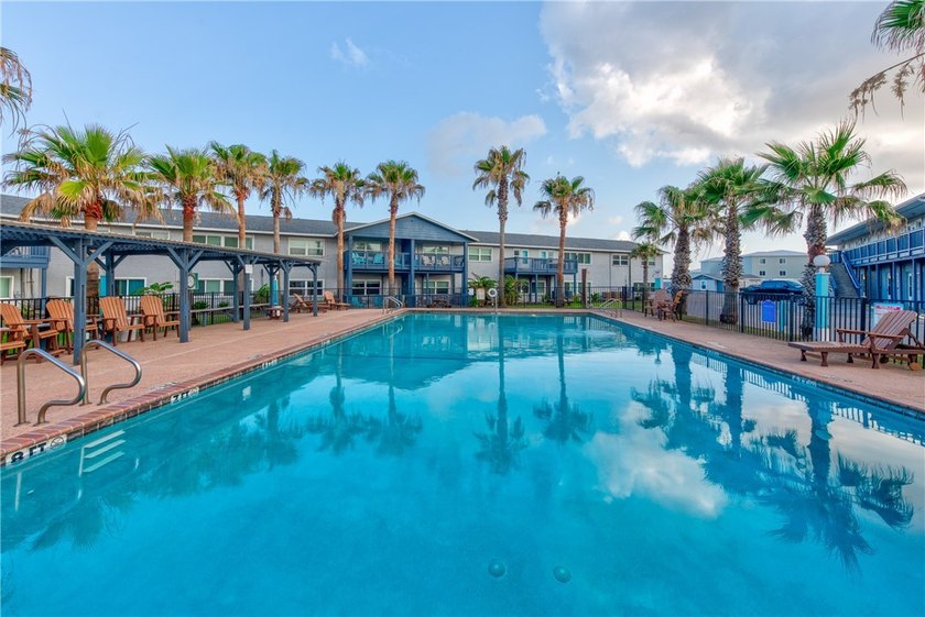 Tucked inside the Sea Isle Village complex on Eleventh Street - Beach Condo for sale in Port Aransas, Texas on Beachhouse.com
