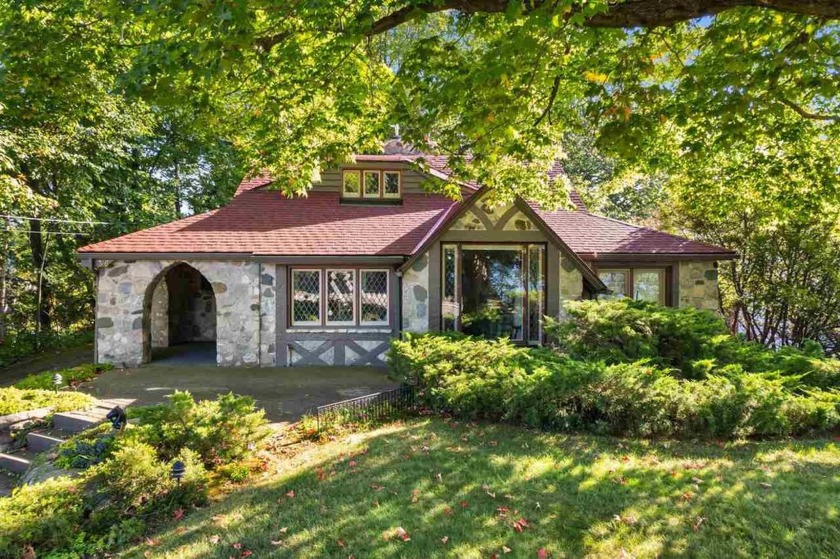 Welcome to this stunning Earl Young-designed stone home in - Beach Home for sale in Charlevoix, Michigan on Beachhouse.com