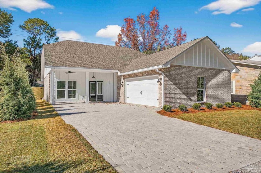 This newly built home is conveniently situated just minutes from - Beach Home for sale in Pensacola, Florida on Beachhouse.com