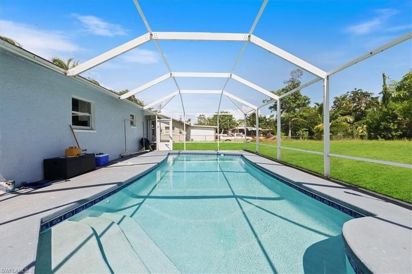 Welcome to this beautifully updated single family pool home in - Beach Home for sale in Fort Myers, Florida on Beachhouse.com