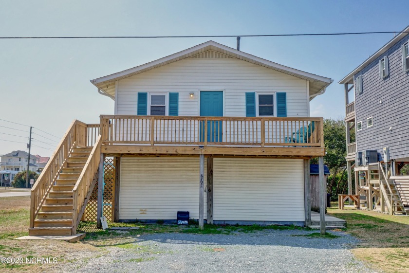 Located on a large corner lot with views of the ocean and  the - Beach Home for sale in North Topsail Beach, North Carolina on Beachhouse.com