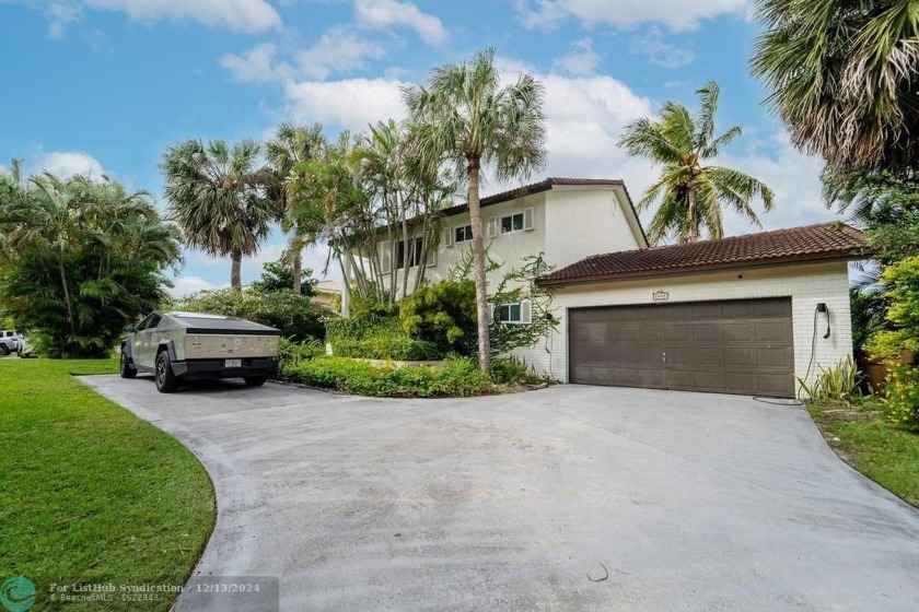 Impeccably remodeled, this 5-bedroom, 4.5-bathroom home, in the - Beach Home for sale in Deerfield Beach, Florida on Beachhouse.com