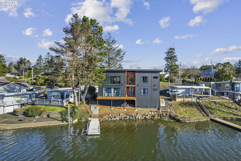 Completed in December 2024, this exquisite lakefront retreat - Beach Home for sale in Neotsu, Oregon on Beachhouse.com