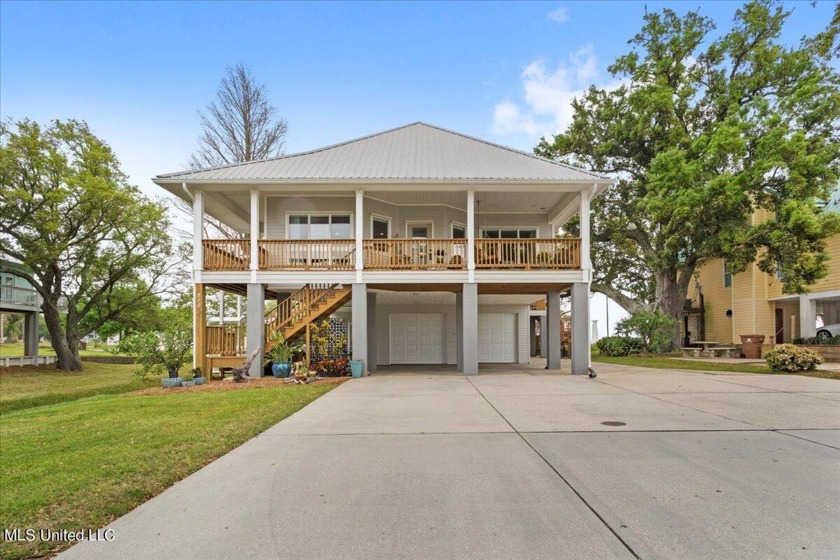 Located in the lively heart of Long Beach, Mississippi, this - Beach Home for sale in Long Beach, Mississippi on Beachhouse.com