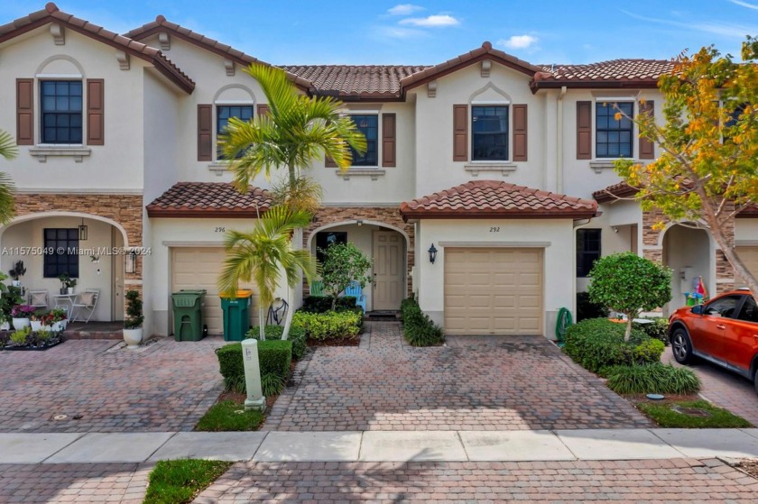 Nestled in a serene gated community, this modern home offers - Beach Home for sale in Homestead, Florida on Beachhouse.com