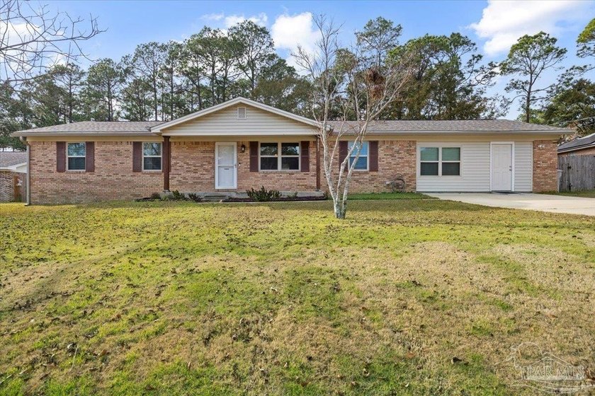 POOL HOME IN THE HEART OF PACE! This well maintained, one owner - Beach Home for sale in Pace, Florida on Beachhouse.com