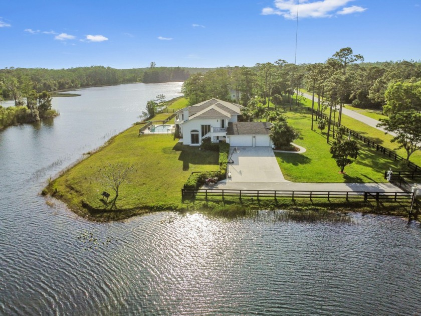 RARE OPPORTUNITY to own an expansive waterfront estate! Welcome - Beach Home for sale in Wellington, Florida on Beachhouse.com