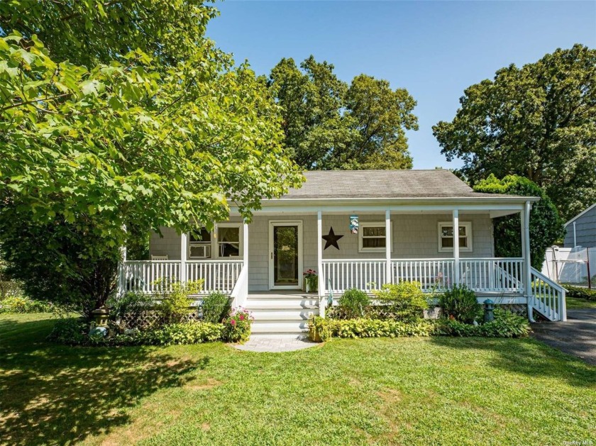 Discover this charming ranch-style home nestled in the Lake - Beach Home for sale in Ridge, New York on Beachhouse.com