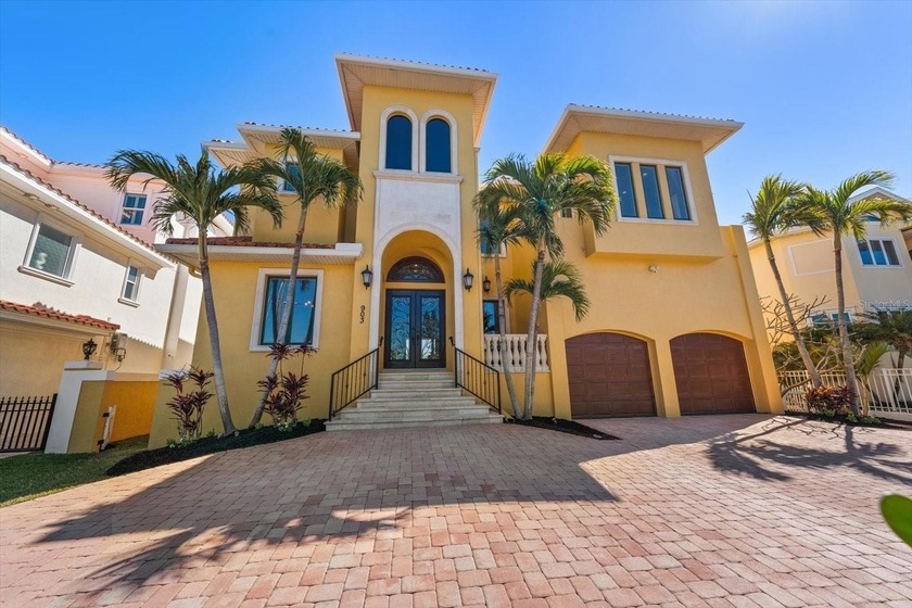 Tucked away at the end of a cul-de-sac, this private and gated - Beach Home for sale in Belleair Beach, Florida on Beachhouse.com