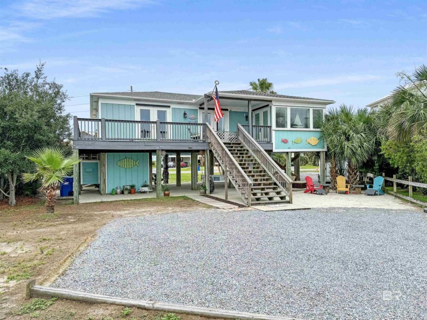 This charming raised beach home boast 3 bedrooms 2 baths and - Beach Home for sale in Gulf Shores, Alabama on Beachhouse.com