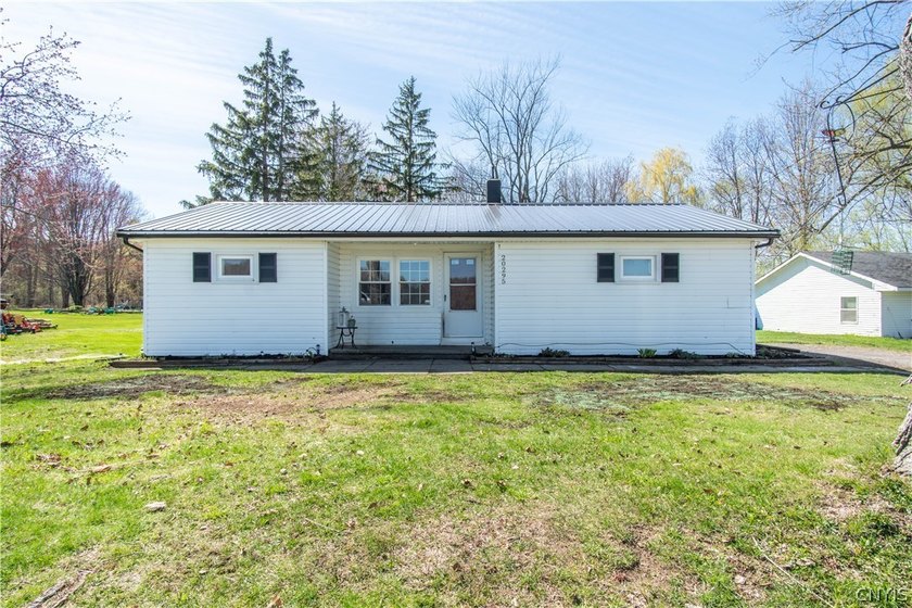 Charming and move-in ready home located just outside of the - Beach Home for sale in Sackets Harbor, New York on Beachhouse.com