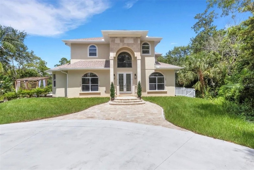 Nestled in Sarasota's highly desirable Desoto Acres, this - Beach Home for sale in Sarasota, Florida on Beachhouse.com