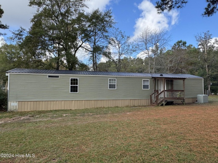 Your Ideal Beach Retreat Awaits! Just 6 miles from the pristine - Beach Home for sale in Supply, North Carolina on Beachhouse.com