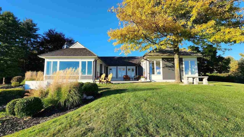 Unparalleled views of Little Traverse Bay greet you from this - Beach Home for sale in Harbor Springs, Michigan on Beachhouse.com