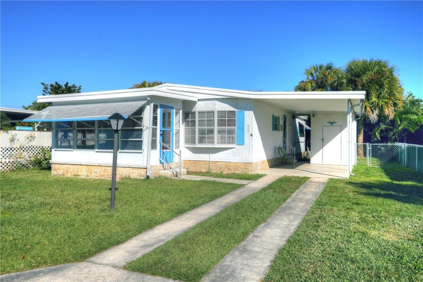 New Roof - April 2024. Fully furnished *island* retreat. Luxury - Beach Home for sale in Barefoot Bay, Florida on Beachhouse.com