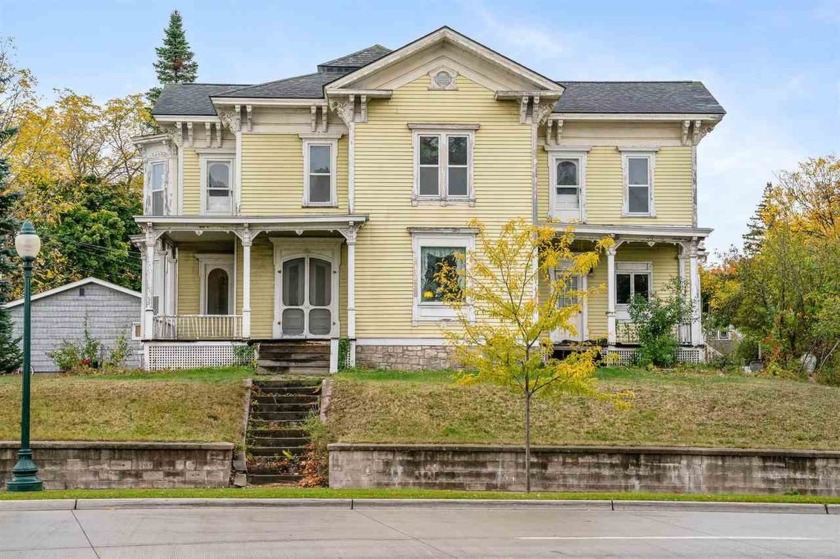 Perched overlooking the City of Petoskey is this Victorian - Beach Home for sale in Petoskey, Michigan on Beachhouse.com