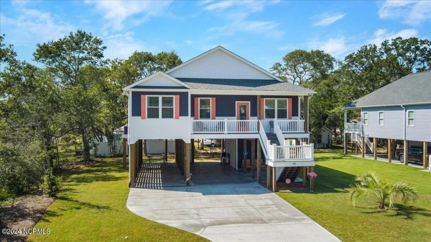 The Lone Palm awaits you!  Built in the spring of '22 by Elan - Beach Home for sale in Oak Island, North Carolina on Beachhouse.com