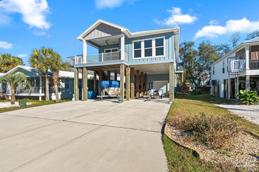 Welcome to this beautifully built 2021 Gold Fortified raised - Beach Home for sale in Orange Beach, Alabama on Beachhouse.com