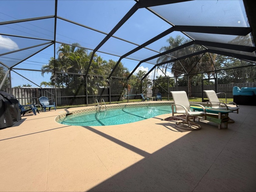 Discover a rare opportunity to own a stunning, NO HOA lakefront - Beach Home for sale in Lake Worth Beach, Florida on Beachhouse.com