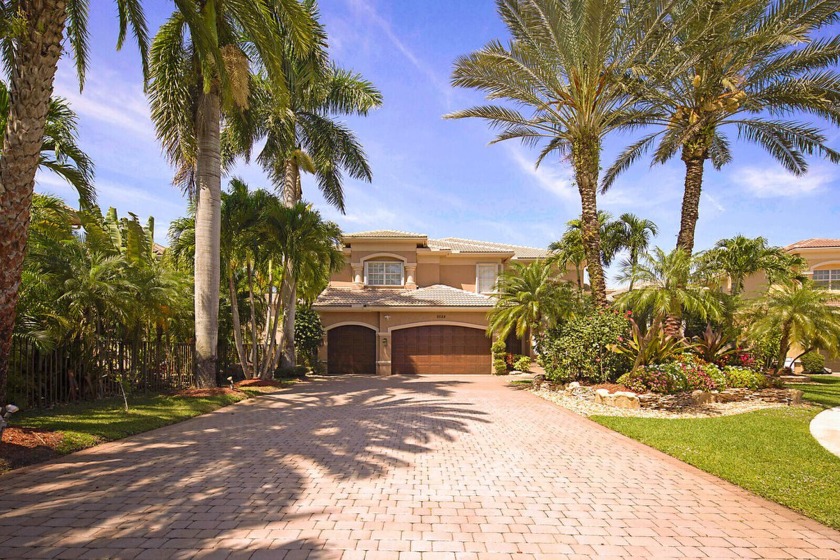 An exquisite waterfront pool home situated on a serene - Beach Home for sale in Boynton Beach, Florida on Beachhouse.com
