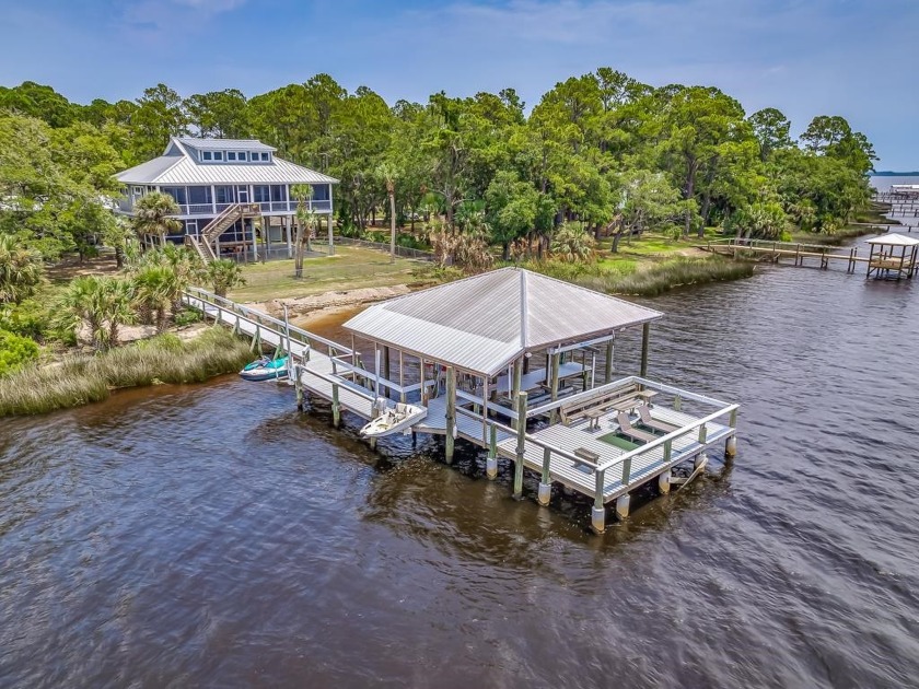 Welcome home to 42 River Drive - a unique, secluded home that - Beach Home for sale in Panacea, Florida on Beachhouse.com