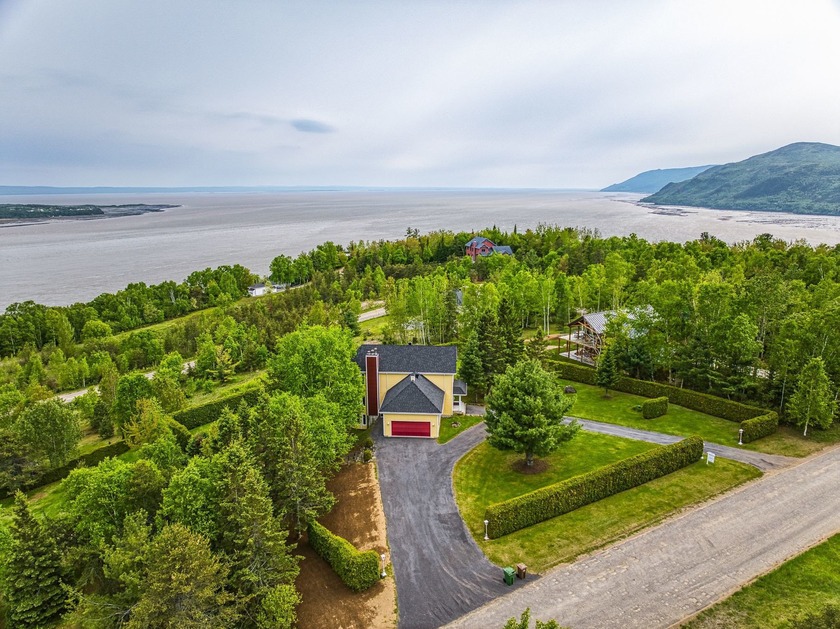 Located at the top of Baie-Saint-Paul, this residence overlooks - Beach Home for sale in Baie-Saint-Paul,  on Beachhouse.com