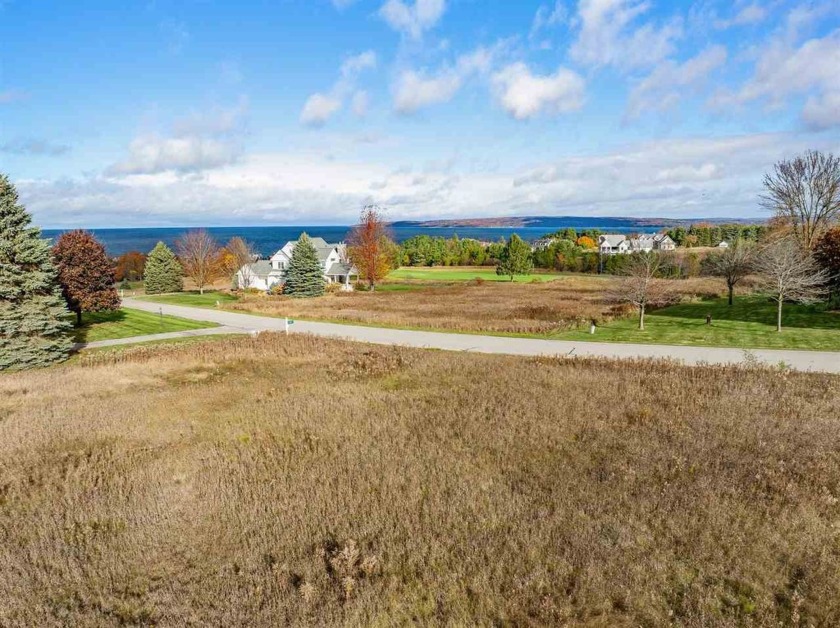 Immerse yourself in breathtaking, panoramic views of Lake - Beach Lot for sale in Petoskey, Michigan on Beachhouse.com