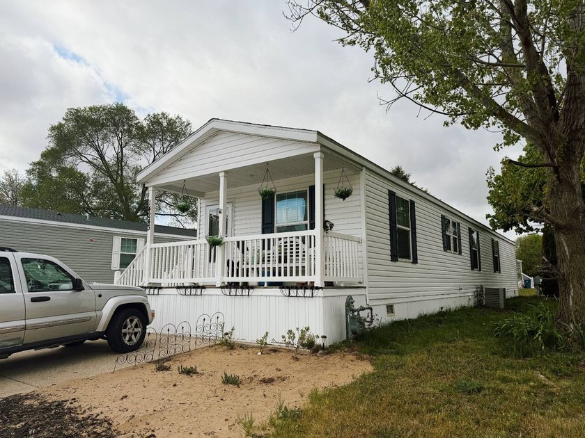 Welcome to this beautifully maintained 2020 mobile home in West - Beach Home for sale in West Olive, Michigan on Beachhouse.com