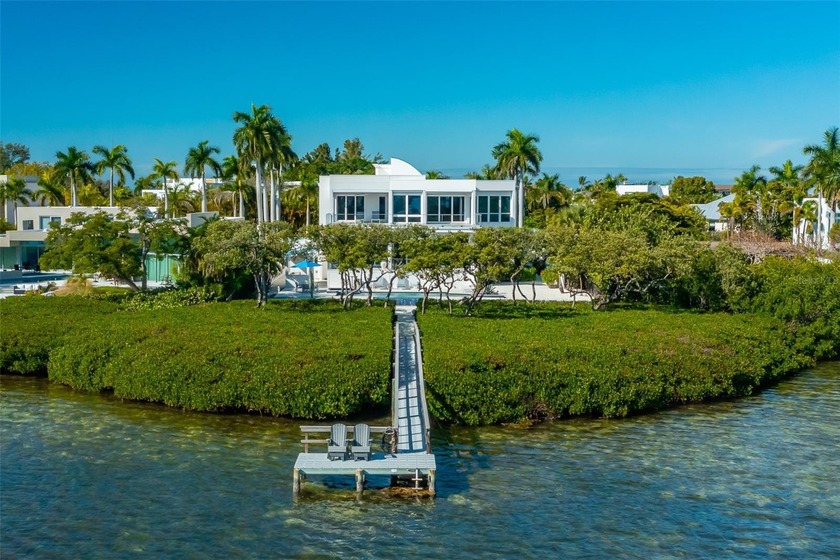 An extraordinary expression of modern waterfront living, this - Beach Home for sale in Sarasota, Florida on Beachhouse.com
