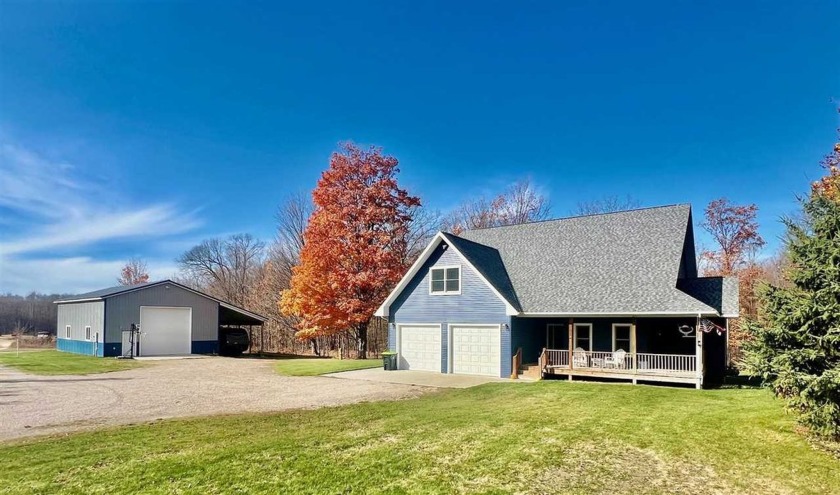 Escape to your own Up North retreat with this incredible 12-acre - Beach Home for sale in Charlevoix, Michigan on Beachhouse.com