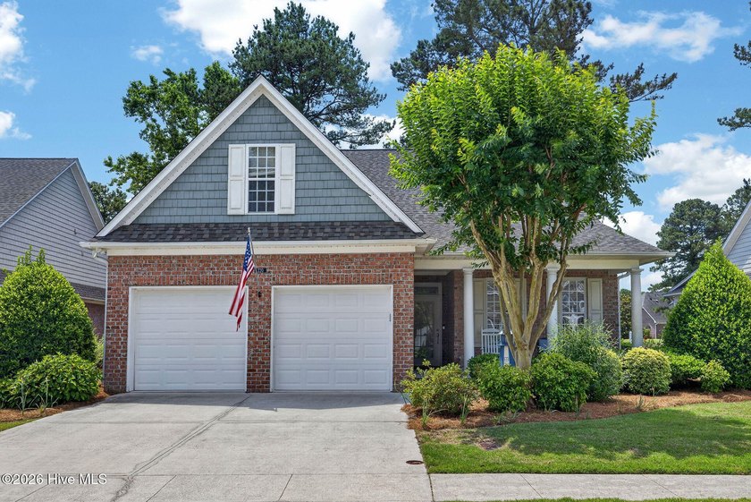 Tucked along the 27th hole of Magnolia Greens' beautifully - Beach Home for sale in Leland, North Carolina on Beachhouse.com