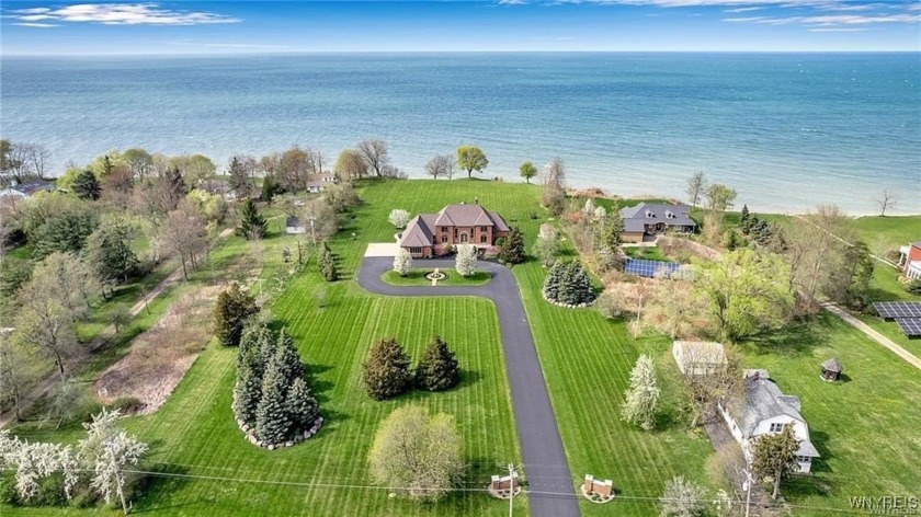 The Key To Your LUXURY LAKE HOME is here at this Custom built - Beach Home for sale in Porter, New York on Beachhouse.com