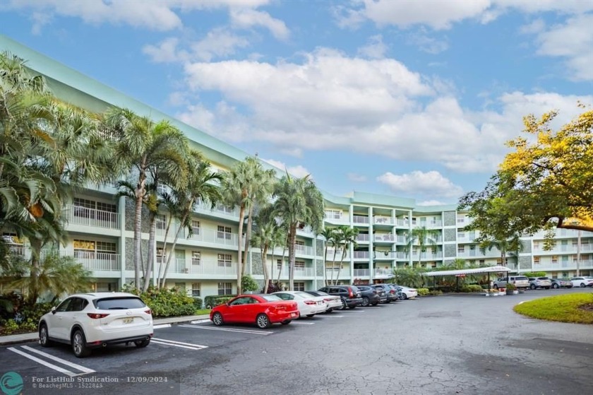 Resort style living in the Grove at Palm Aire!  This well-lit - Beach Condo for sale in Pompano Beach, Florida on Beachhouse.com