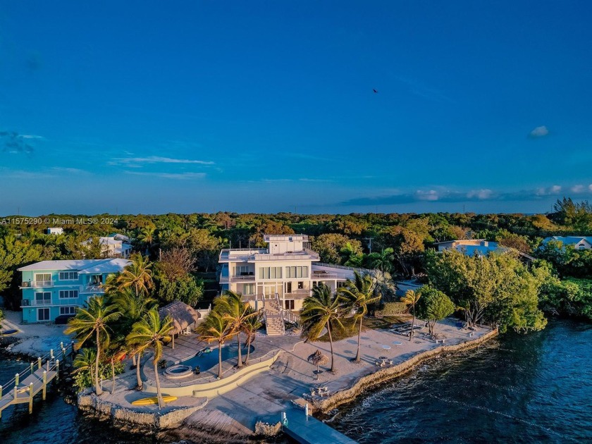 Discover the epitome of luxury living in Key Largo! This - Beach Home for sale in Key Largo, Florida on Beachhouse.com