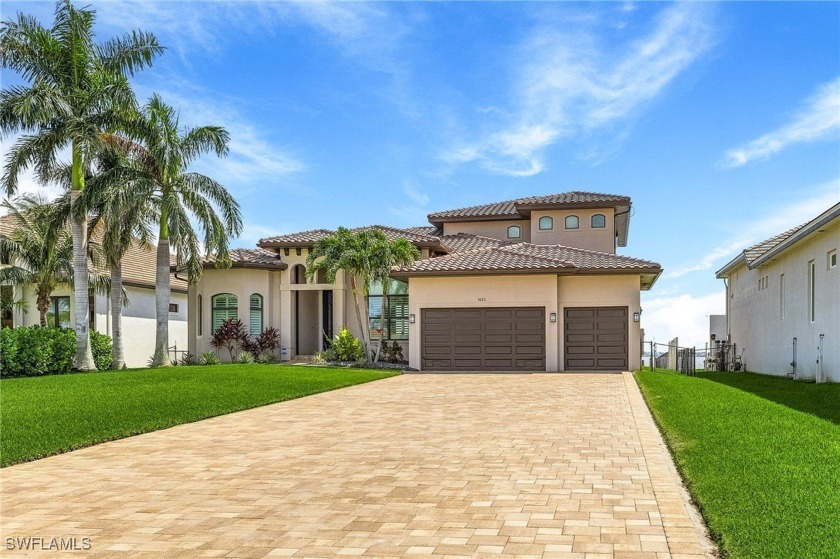 Step into luxury living in this meticulously crafted custom - Beach Home for sale in Cape Coral, Florida on Beachhouse.com