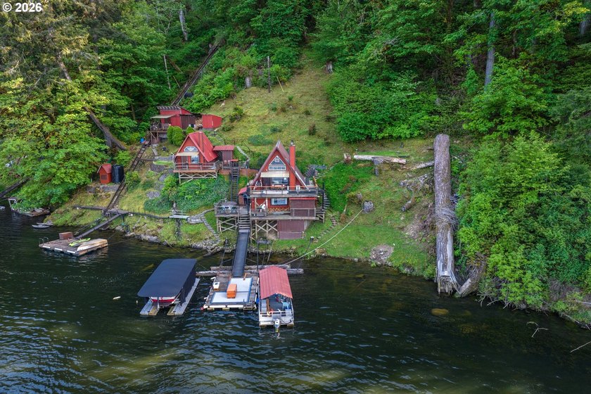 Discover a truly one-of-a-kind opportunity on the shores of Loon - Beach Home for sale in Reedsport, Oregon on Beachhouse.com