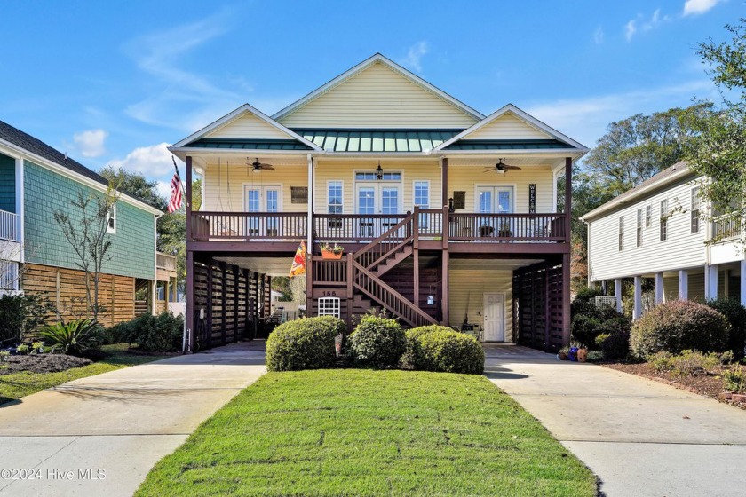 This charming piling home offers a welcoming blend of coastal - Beach Home for sale in Oak Island, North Carolina on Beachhouse.com