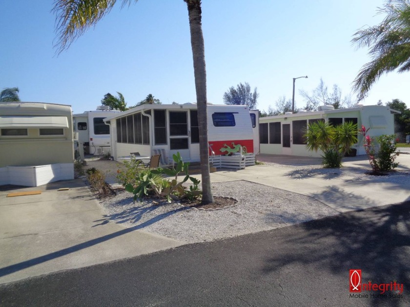 Cute Travel Trailer with an attached raised and enclosed 7x25 - Beach Home for sale in Bradenton, Florida on Beachhouse.com