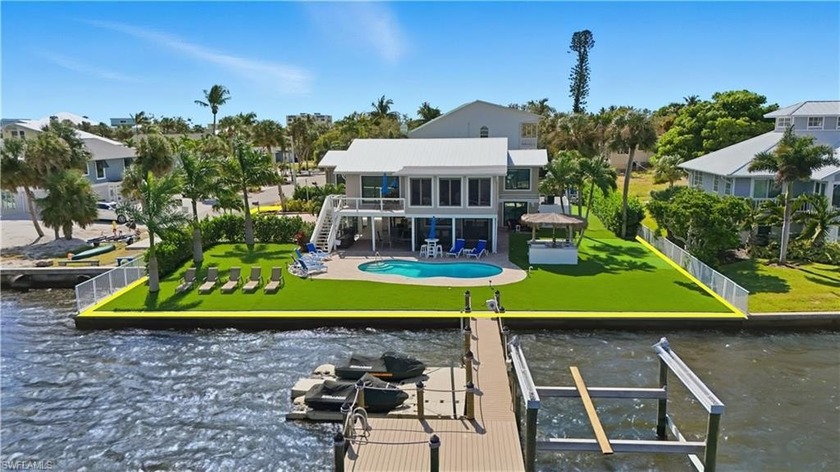 Nestled on a tranquil bayfront setting, 205 Bayview Avenue - Beach Home for sale in Fort Myers Beach, Florida on Beachhouse.com