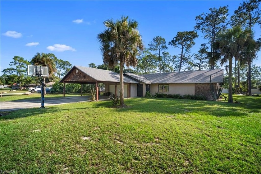 Don't miss this incredible opportunity -- a beautiful half-acre - Beach Home for sale in Lehigh Acres, Florida on Beachhouse.com
